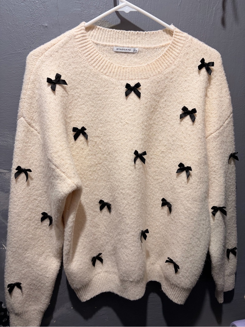 Staccato Cream Crewneck Sweater with Black Bow Details